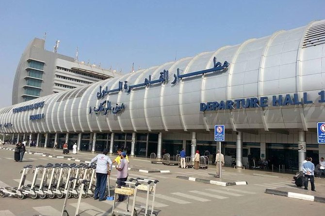 Private Transfer - Cairo Airport Arrivals Hall to Hotel - Arriving at Cairo International Airport with a name sign