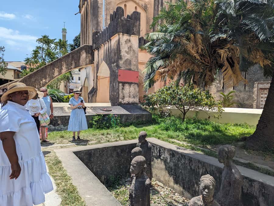 Stone Town: Stone Town and Prison Island Private Day Trip - The slave market is powerful and not easy viewing