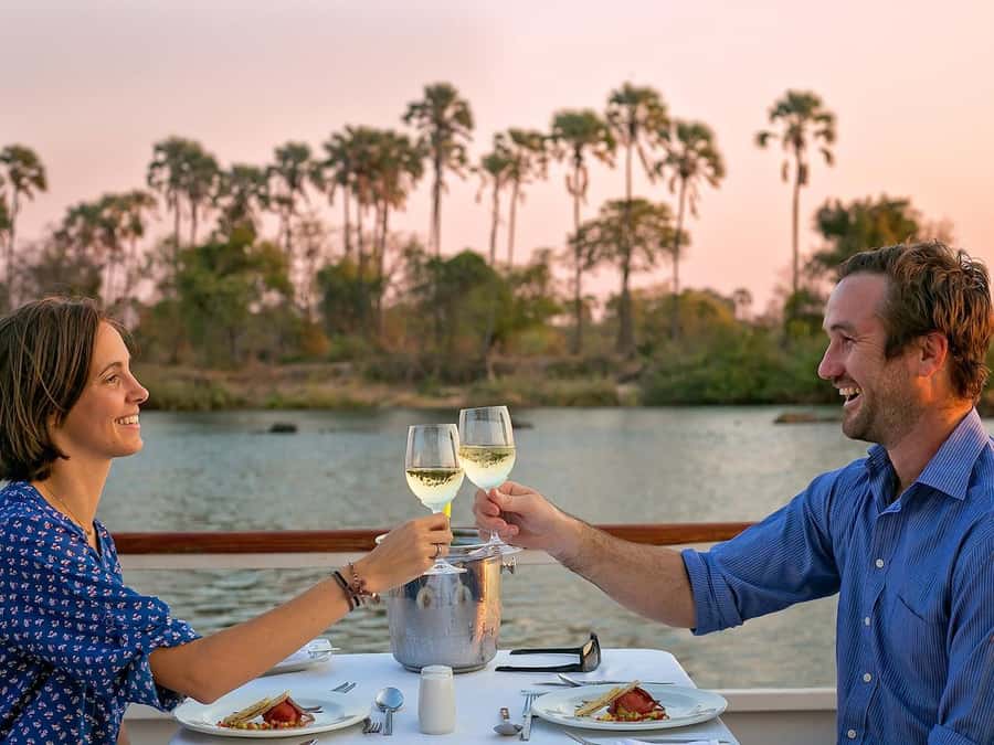 Victoria Falls: Dinner Cruise on the Zambezi River - Sunset, photographs, and the shift after dark